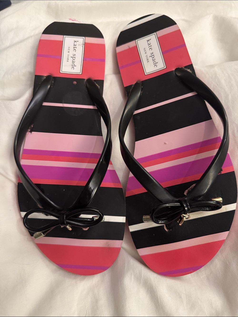 kate spade Black and Pink Striped Bow Flip Sandals
